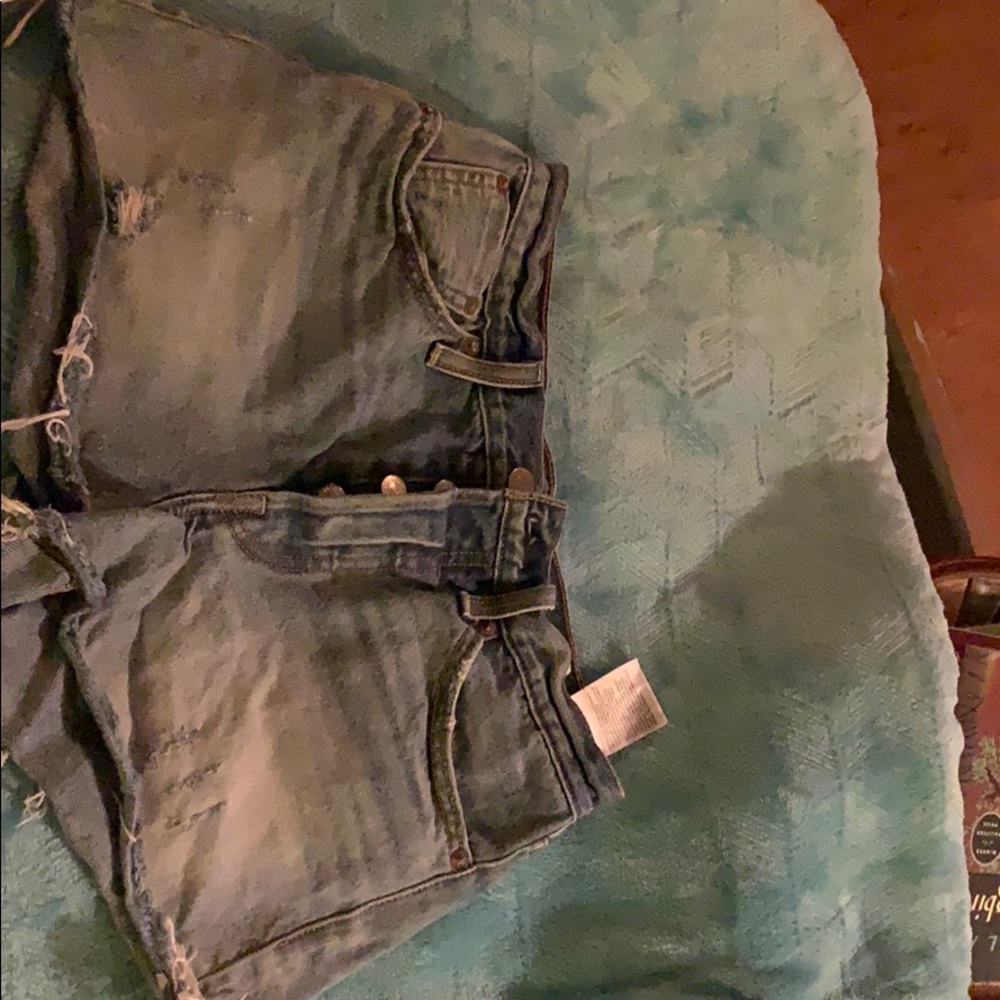 Slightly distressed faded jean shorts